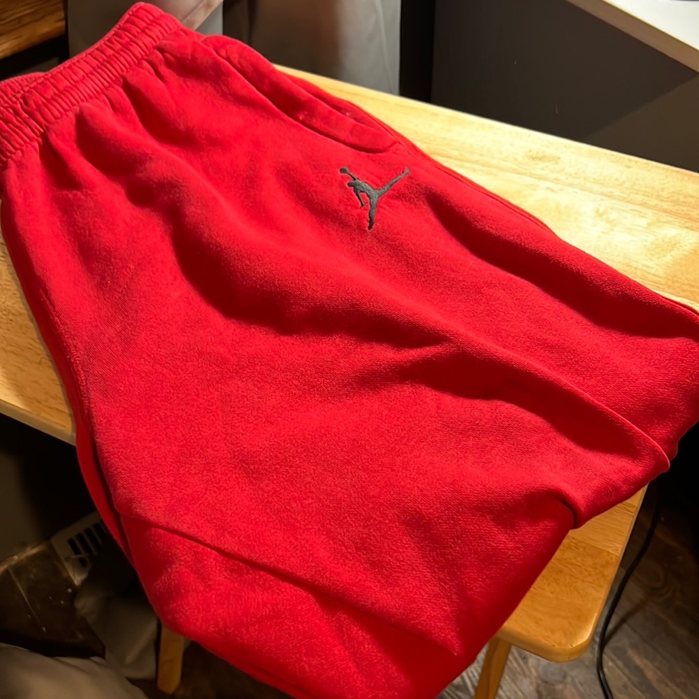 Red Jordan sweatpants size large, never worn.